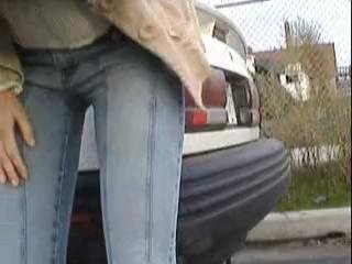 Pissing: Alexa pees her tight jeans outside