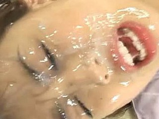 Sayaka Miura legs strapped jointly and dudes cum all over her face.