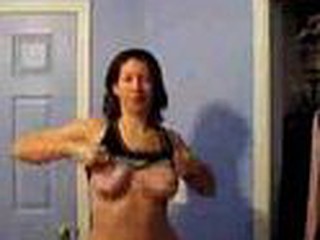Mature housewife strips off her undies on webcam, still got good tits and fingers her well pounded cunt.