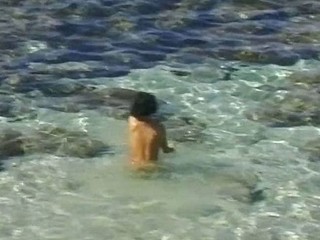 Busty broad gets a mouthful of hot german cum at the beach